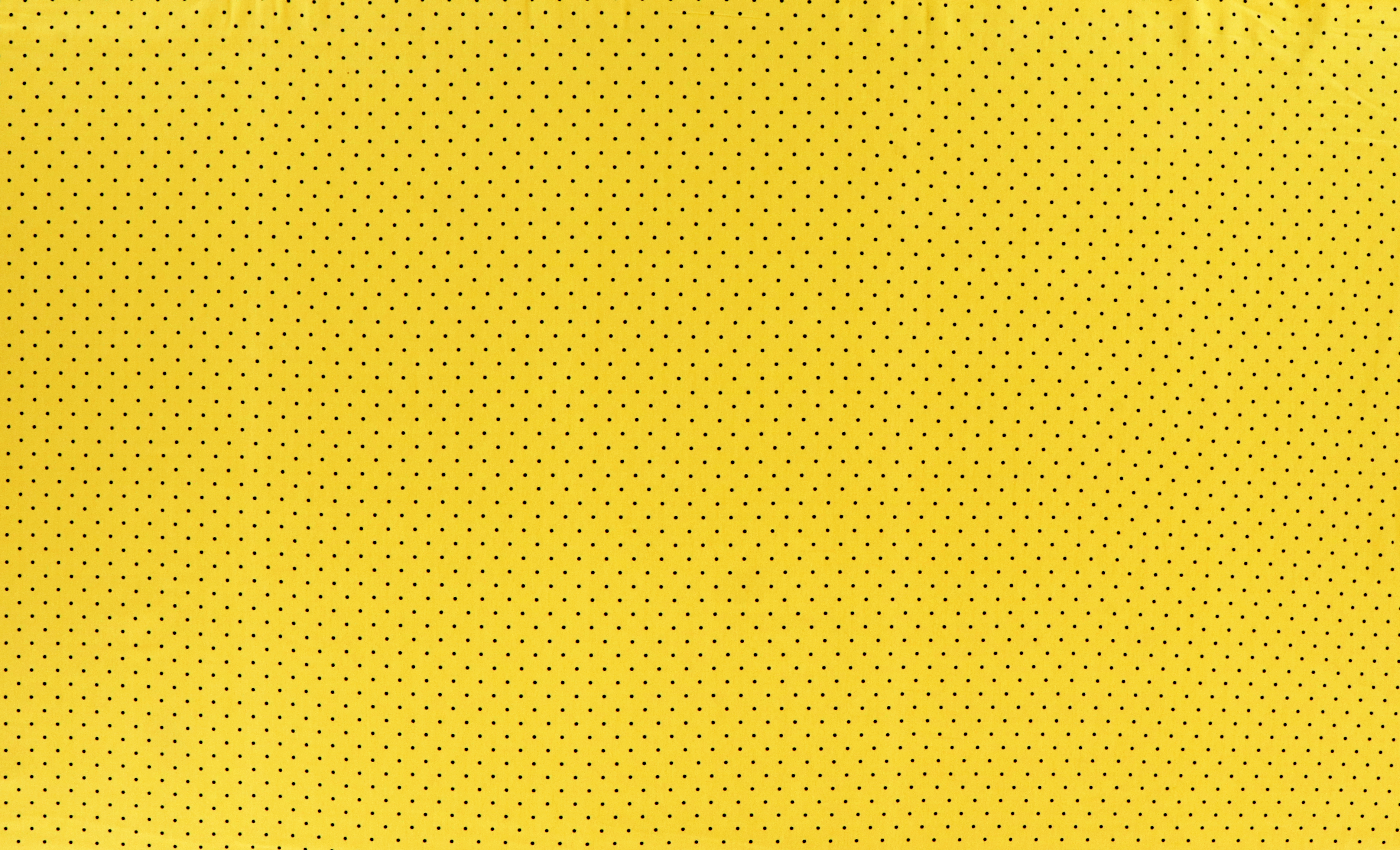 Jersey di cotone, puntini neri su fondo giallo